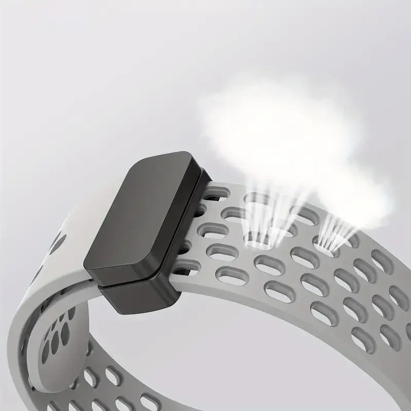 Close-up view of a gray breathable silicone sport strap for Apple Watch, showcasing the perforated design with simulated airflow to highlight ventilation features.