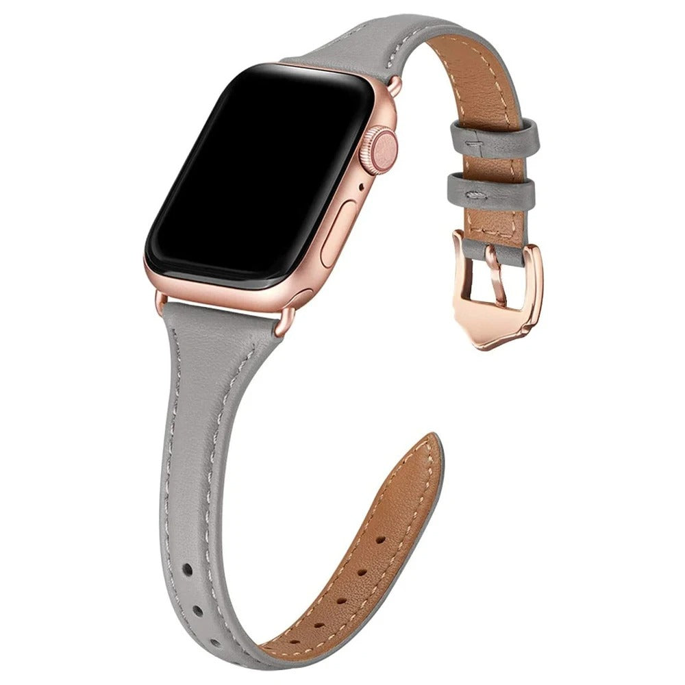 Slim gray leather Apple Watch strap with rose gold hardware and classic pin buckle.