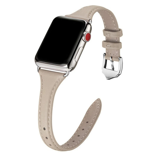 Elegant beige leather Apple Watch strap with silver hardware and classic pin buckle.