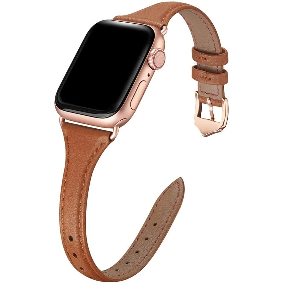 Slim brown leather Apple Watch strap with rose gold hardware and classic pin buckle.