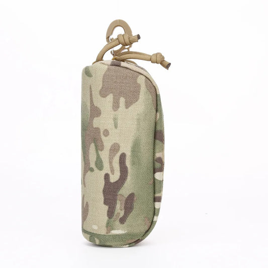 Camouflage MOLLE glasses case made of heavy-duty 1000D nylon, designed for outdoor use with tactical straps and zipper closure.