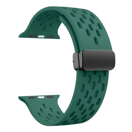 Green perforated rubber sport strap for Apple Watch with black clasp, compatible with all Apple Watch sizes