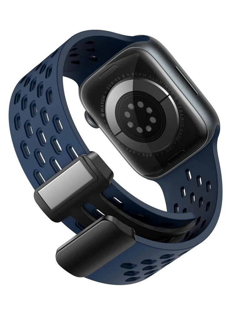 Navy blue perforated sport band on Apple Watch Series 8 45mm, rear view with clasp
