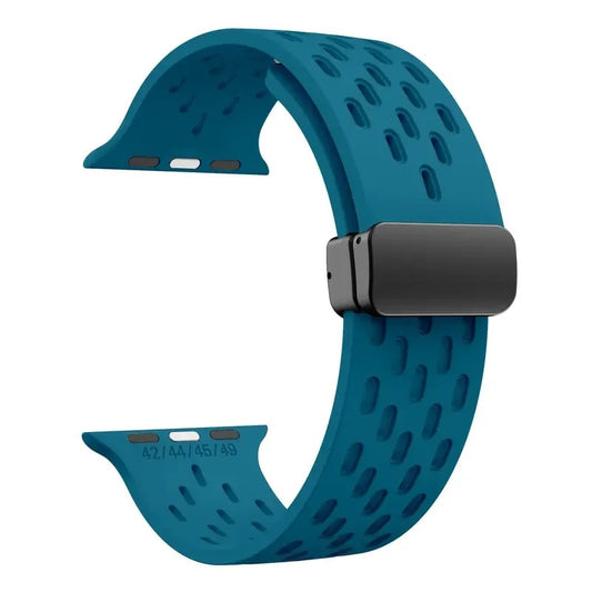 Ocean blue perforated rubber sport strap for Apple Watch with black clasp, compatible with all Apple Watch sizes