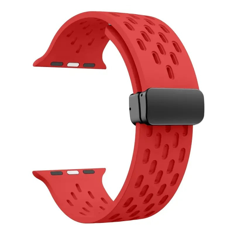 Red perforated rubber sport strap for Apple Watch with black clasp, compatible with all Apple Watch sizes