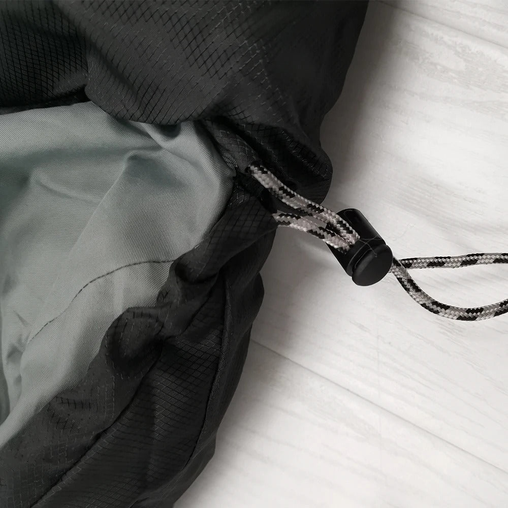 Close-up of sleeping bag zipper detail — shows sturdy zipper mechanism and fabric overlap for secure closure and heat retention.