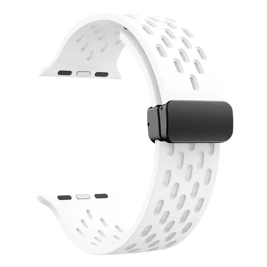 White perforated rubber sport strap for Apple Watch with black clasp, compatible with all Apple Watch sizes