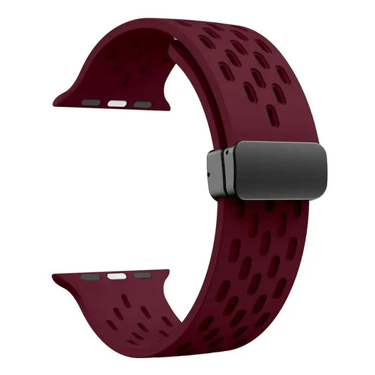 Wine red perforated rubber sport strap for Apple Watch with black clasp, compatible with all Apple Watch sizes
